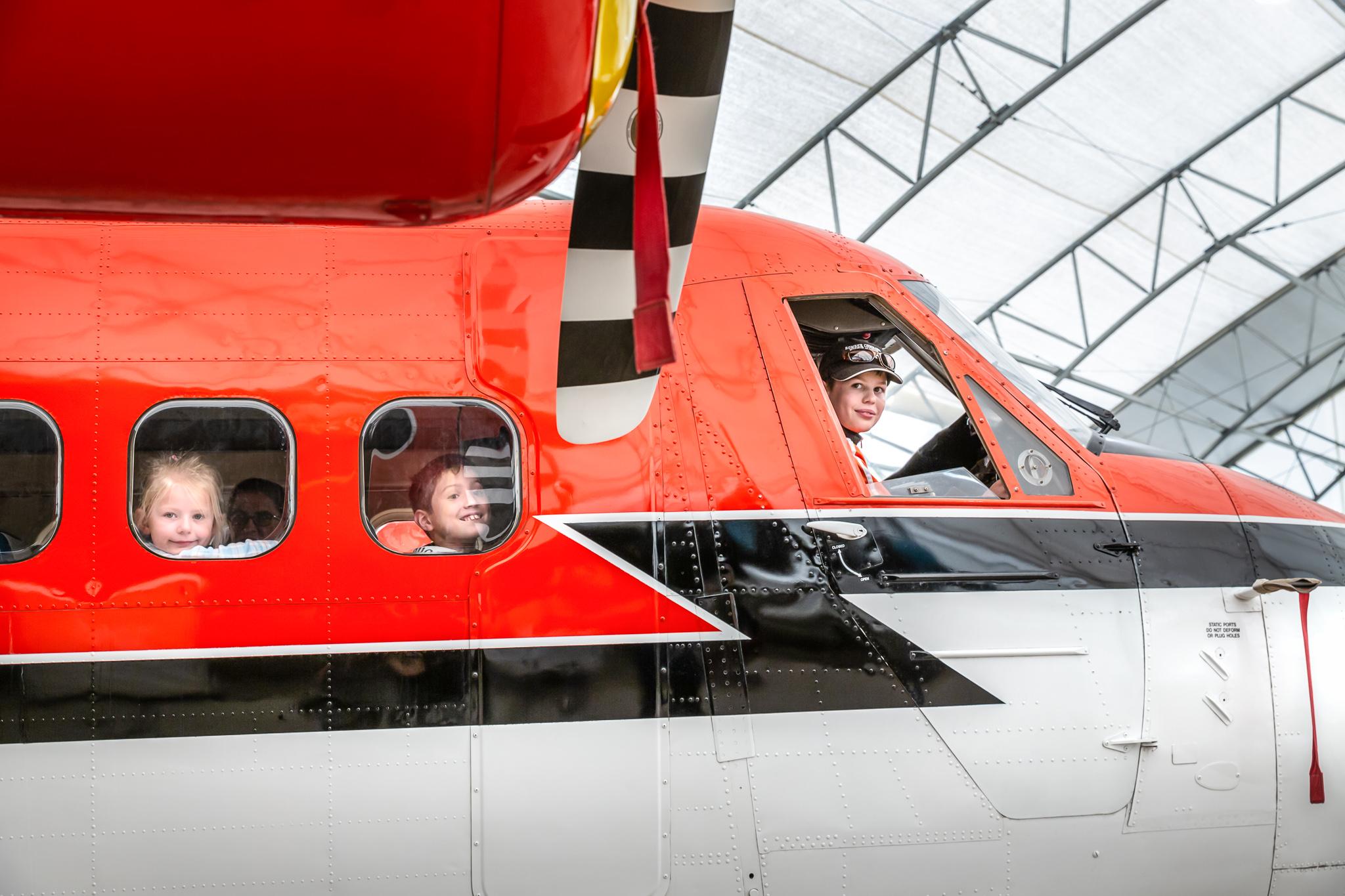 children in a Twin Otter airplane
